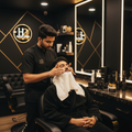 H2 Makeup Studio grooming artist performing luxury facial on Indian groom